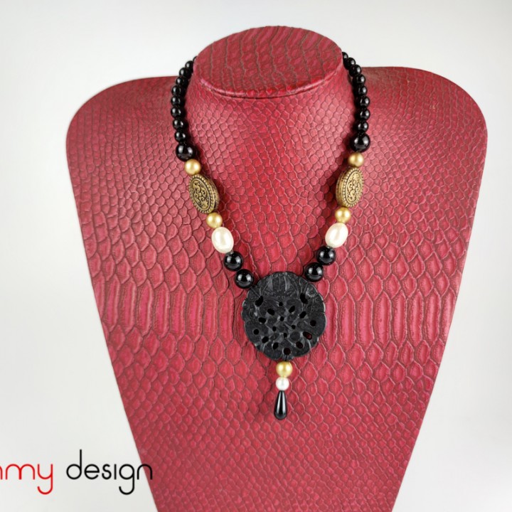 Necklace designed with black marble, onyx and metal beads